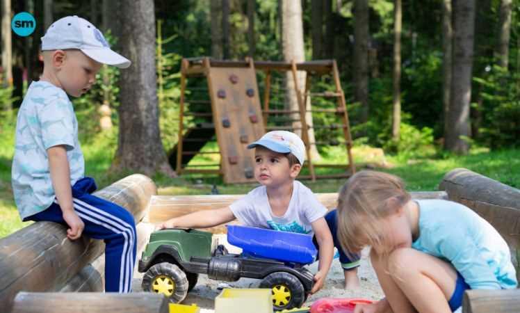 Group of kids playing the sand