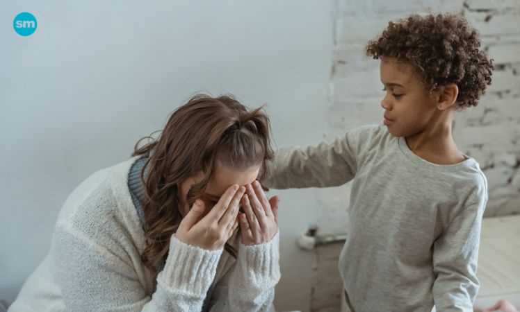 Son comforting hos mother